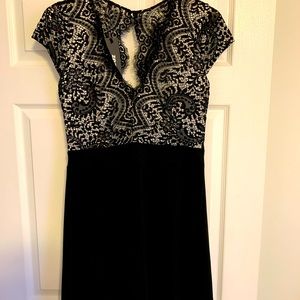 Little black dress with top lace detail, open back